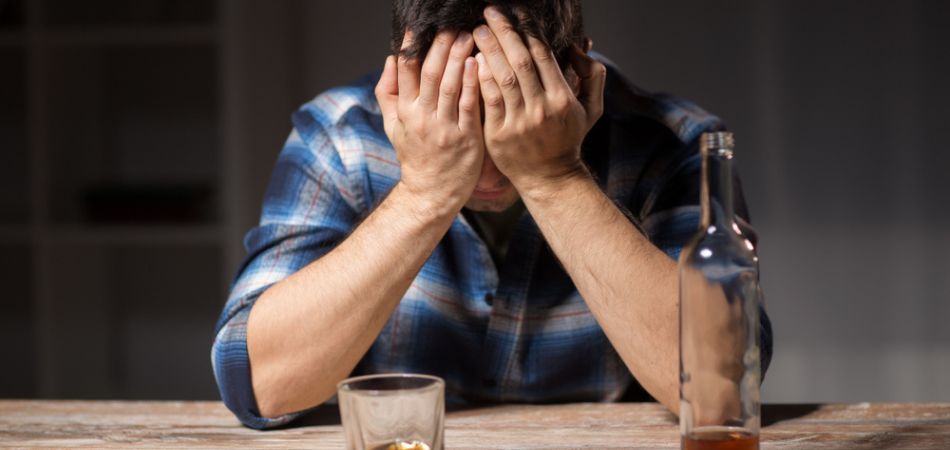 depressed man on alcohol addiction