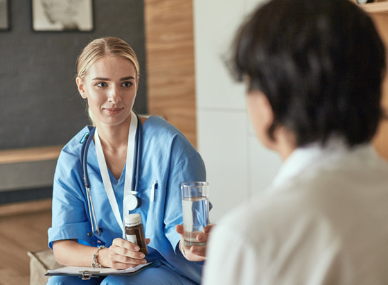 alcohol-detox-nurse-with-water