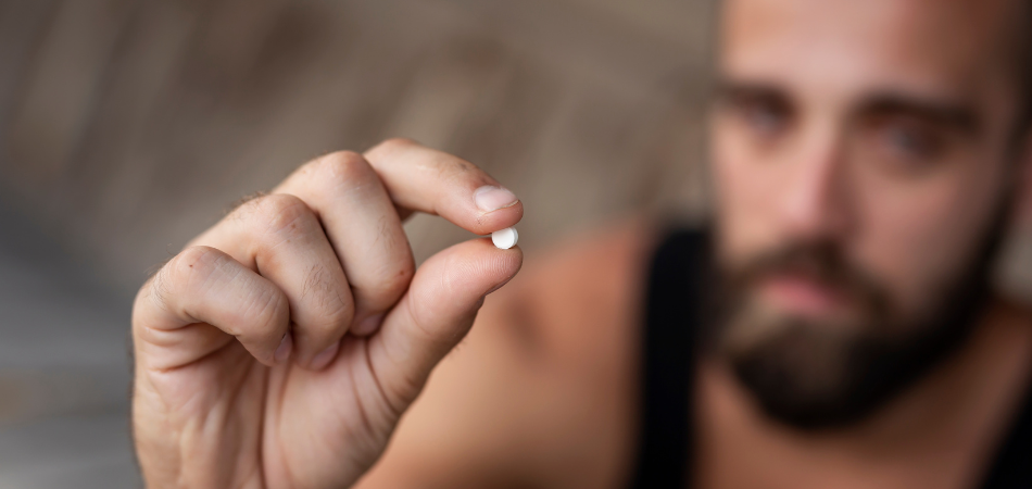 ecstasy-addiction-man-with-pill