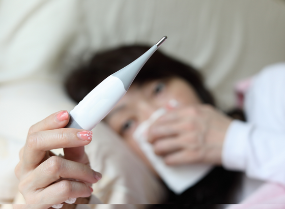 prescription-drugs-woman-with-fever